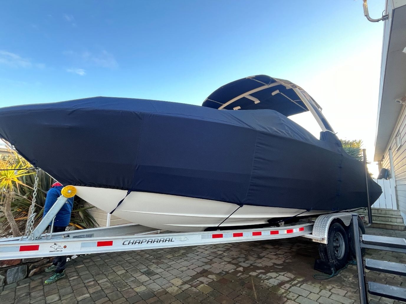 Chaparral 267 Full Winter Cover 1 Chaparral 267 on its trailer with a navy deep-sided full winter cover fitted around the tower