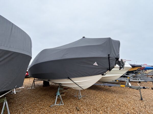Finnmaster T8 with a grey full winter cover fitted