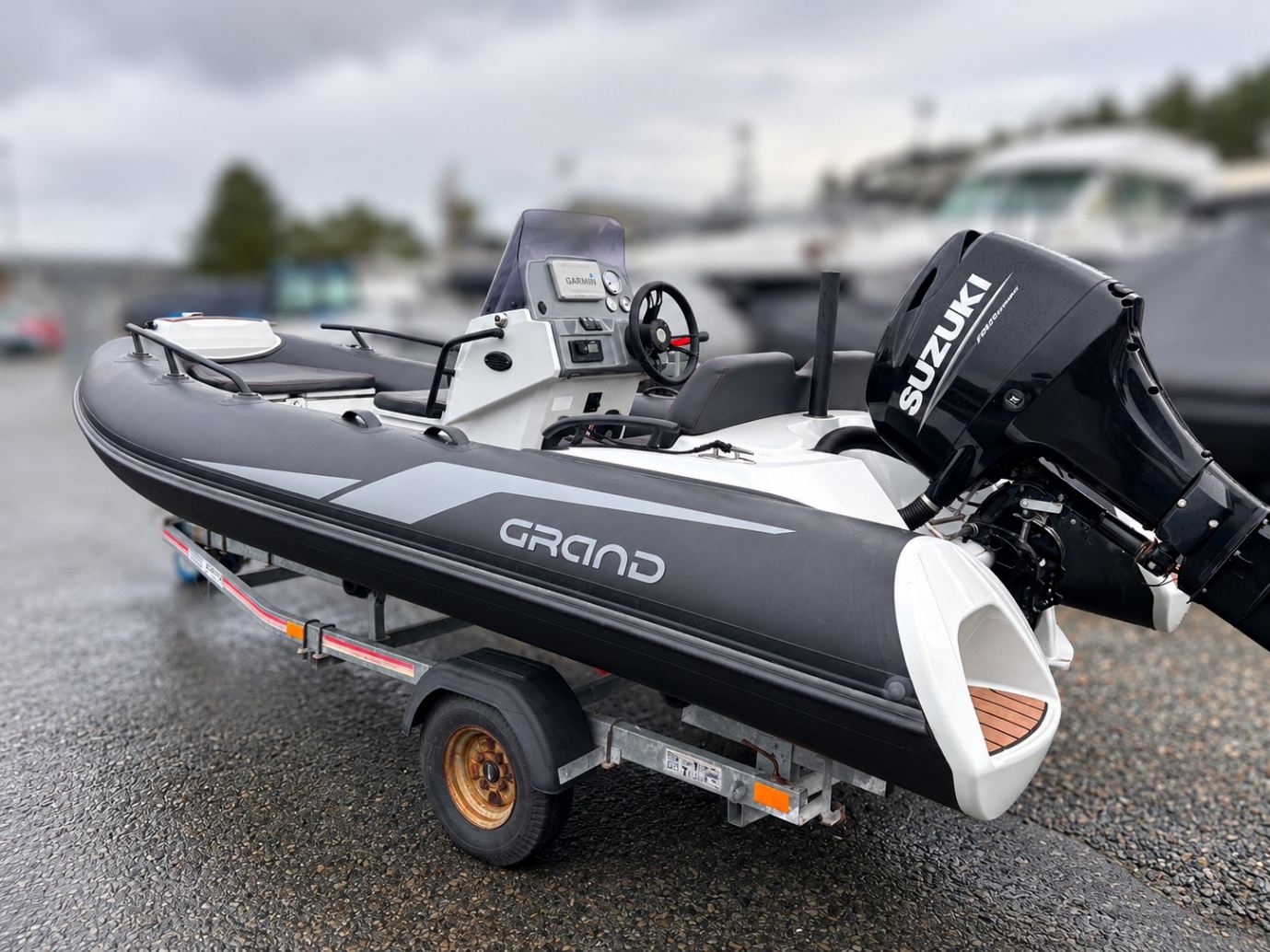 Grand 420 Full Winter Cover 2 Grand 420 RIB with centre console and Suzuki outboard, uncovered, on its trailer